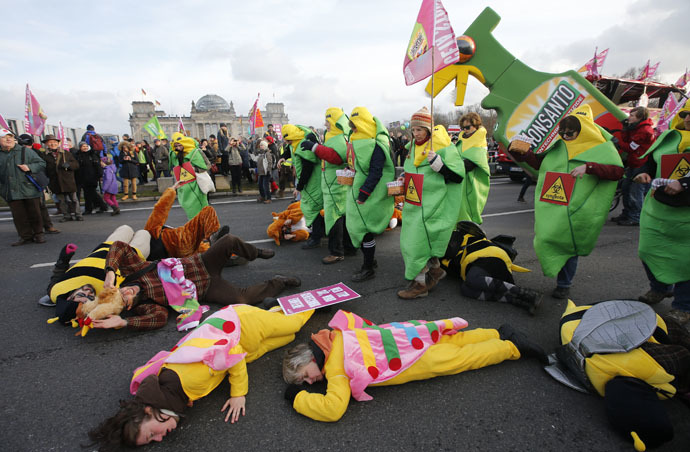 German farmers and consumer rights activists performs as they take part in a march to protest against the Transatlantic Trade and Investment Partnership (TTIP), mass husbandry and genetic engineering in Berlin