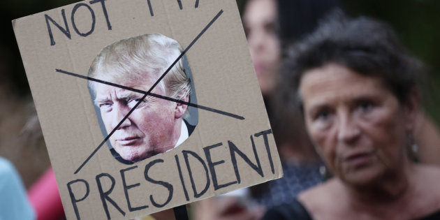 A demonstrator protests against the visit of U.S. President Trump in Rome XXSTRINGERXX XXXXX / REUTERS 